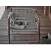 The Lee outdoor armchair in a setting