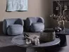 The René armchair by Meridiani in a living area