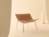 Omega armchair by Lema in a living area